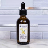 litha beard oil studio photography by brigid trading company llc kitsap county washington state lemons orange yellow background citrus with ylang ylang and natural myrtle essential oils aromatherapy premium grade all natural beard care oil for him man mens beard mustache care shaping sculpting hand made in washington state
